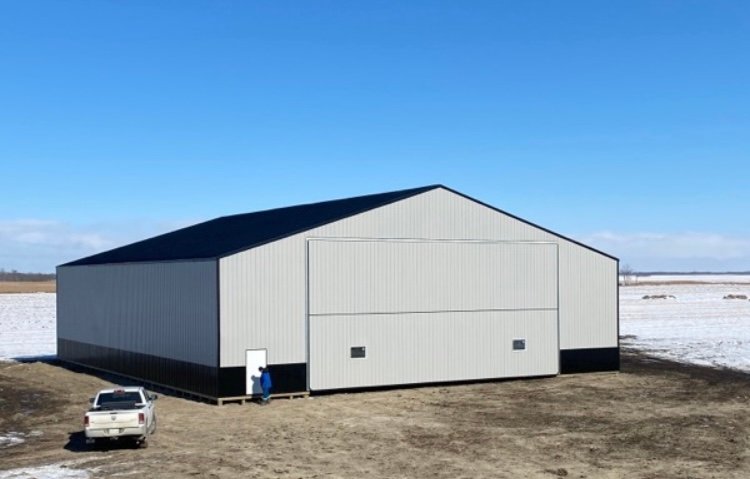 Completed pole shed structure, showcasing durable building supplies